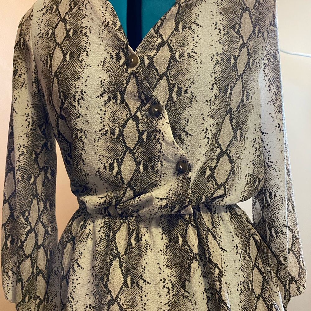 Peplum snake skin long sleeve top